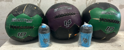 (2) 10LB Medicine Balls, 14LB Medicine Balls, And (2) Shake Cups