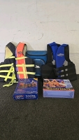 (1) Arctic Zone Cooler Backpack (1) Stearns Life Vest (1) Hang Ten Water Sports Life Vest (2) Boxes of Holiday Lights