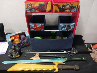 Spiderman toy shelf with 5 cubbies 3 kid play swords 8 small dinosaur toys. 1 batman piggy bank 1 wonder wheels excavator truck