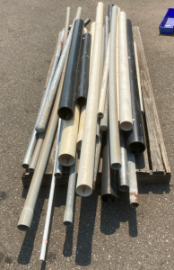 Assortment of PVC and Metal Pipes