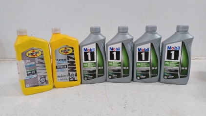 (1) Platinum Full Synthetic - 5W-20 (4) 1-Quart Mobil 1 ESP - 0W-40 (1) 1/2-Quart Pennzoil Ultra Plainum Full Synthetic - 0W-20- Leaked