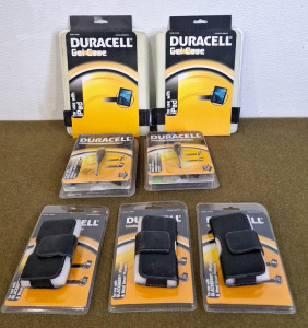 (2) Duracell Multiple USB Cell Phone Charger Kits, (3) Duracell Leather Phone Cases & (2) Duracell iPad Gell Cases