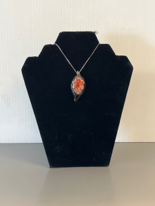Glass Flower Pendant with silver toned chain.