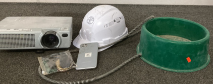 HITACHI LCD 2200 LUMEN DIGITAL PROJECTOR ( UNTESTED NO POWER CORD), HEATED PET WATER DISH, CELERO 5G PHONE (NEEDS CHARGED). POUCH OF SHOE POLISH.