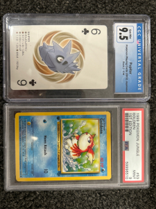 (2) Graded Pokémon Cards- 1999 Jungle Goldeen 1st Edition and Pupitar Pokemon Playing Card Japanese Black