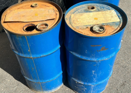 (2) Blue Barrels. Main Building