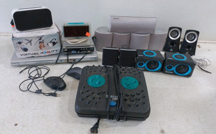 (1) JBL Computer Speakers (1) Pioneer 5-Point Speaker System (1) Movies 2 Go DVD/Video Drive (1) Gabba Goods VR (1) Sharper Image AR Goggles Set (1) Equity Alarm Clock (1) Conair Dr. Fabricant's Foot Massager