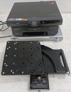 (1) VHS Player (1) RCA DVD Player w/ "What A Girl Wants" DVD (1) Curtis DVD Home Theater (1) VM400 TV Mount