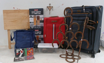 (1) CD's - Whole Bag - Music (2) TV Dinner Trays (2) Luggage - Tommy Hilfiger- Lucas (1) Horseshoe Decor (12) Wall Hooks (2) Sets of Pantry Sealer Container