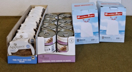 (1) 18 Count Box Of Applaws Cat Food, Tuna Fillet W/Crab, (1) 24 Count Box Of Applaws Cat Food Mackerel W/ Sardine In Broth & (2) 100 Count Boxes Of 4-Gallon Drawstring Trash Bags