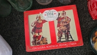 (1) Set of 4 Coca Cola Tin Coasters from 1983 (1) Set of Coca Cola Playing Cards from 1994 (1) 6-Pack of Coca Cola Classic Bottles of Soda from 1998 and so Much More Memorabilia - 9