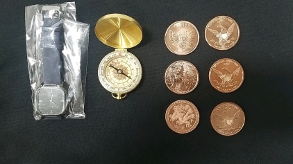 (6) .999 Copper Coins (1) Quartz GENEVA Watch (1) Compass