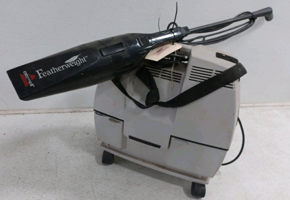 (1) Bissell FeatherWeight (1) Vacuum