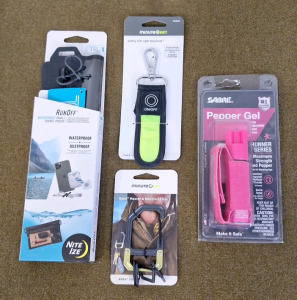 (1) NiteIze, Waterproof Pouch, (1) MinuteKey LED Keychain, (1) MinuteKey Apex Master & Mini Carabiner & (1) Sabre Pepper Jell Spray