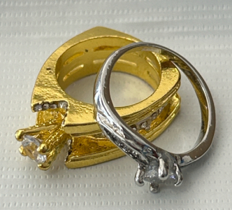 Silver Toned Ring Size 9 and A Gold Colored Ring Size 5