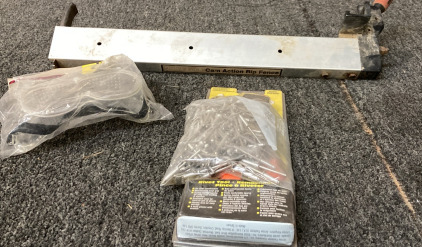 QUCIKLOCK CAM ACTION RIP FENCE, SAFETY GOGGLES, HEAVY DUTY RIVET TOOL WITH A BAG OF RIVETS.