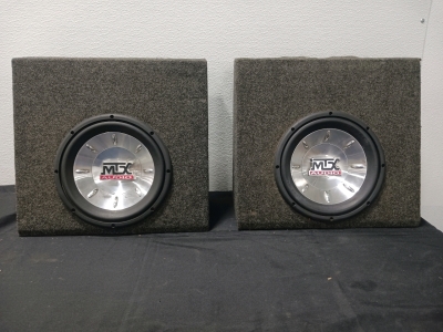 2 MTX 10 Inch Subwoofers In Truck Boxes.