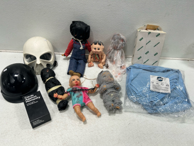 (1) Cards against humanity box (1) Box of Halloween dolls (2) Packages of rags