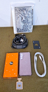 (1) Samsung S20FE Cell Phone Case Purple, (1) USB-C To USB-C Cable, (1) Bike Lock, (1) Ace Card Bottle Opener & (1) Dragon Journal
