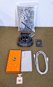 Samsung S20FE Cell Phone Case Silver, (1) USB-C To USB-C Cable, (1) Bike Lock, (1) Ace Card Bottle Opener & (1) Dragon Journal