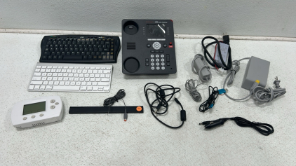 (2) Wireless keyboards (1) Thermostat (1) Commercial phone base and more!!