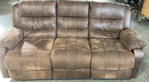 BROWN RECLINING COUCH.