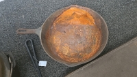 (1) Cast Iron Skillet (1) Cast Iron Dutch Oven (2) Cast Iron Griddles (1) Dutch Oven Lid Lifter - 4