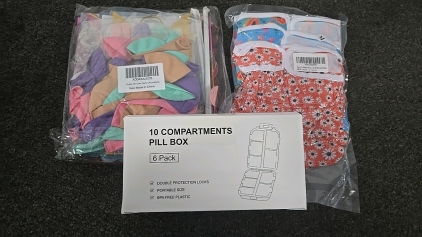 (1) Set of Flutter on Over Party Decorations (1) Set of 3 Swim Diapers in Size Medium (1) 10-Compartment Pill Box