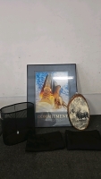(2) Blackout Curtains (1) Moose Print on a Wood Slice (1) Spaceship Prin with a Quote About Commitment on the Bottom (1) Metal Basket with Handles