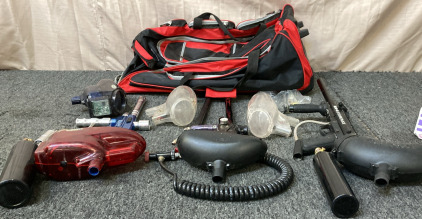 (3) PAINT BALL GUNS AND EQUIPMENT WITH RED DUFFLE BAG.