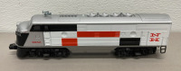 Lionel Trains New Haven Set #8851,#8852,#8864 NH ABA Locomotives 1978-1979 Power Unit Has Twin Motors. #6-9272 NH Caboose - 4