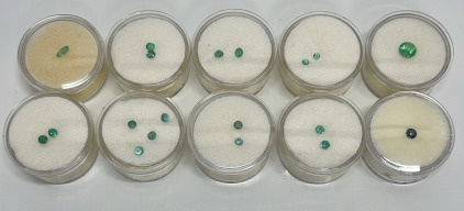 (17) Round And Marquis Cut And Faceted Emeralds Sizes 2.5mm To 3.5mm, (1) Green Cubic Zirconia 6mm, (1) Sapphire 3.6mm
