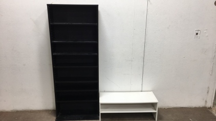 Black bookshelf, and a white desk top organizer