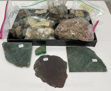 Bags Of Quartz Crystal, Morrisonite, Snakeskin Agate, Powellite, Mineral Samples, (2) Jadeite Slabs, And One Dinosaur Bone Slab W/ Display Tray