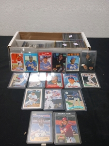 Assorted Baseball Cards In Plastic Sleeves