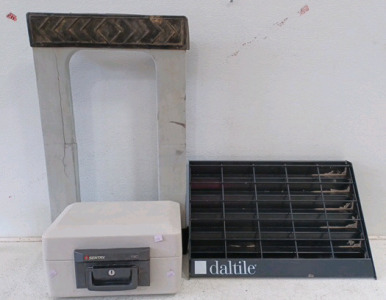 (1) Furniture Dolly (1) Daltile Display/Brochure Rack (1) Sentry Safe - 1150