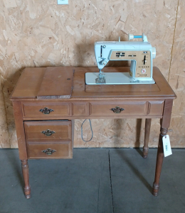 Singer Sewing Machine with Cabinet