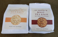 (1) 60-Bag Package Of Ginger Tea Bags, (1) 60-Bag Package Of Burdock Root Tea Bags, (1) 1.7-Oz Package Of Ceylon Cinnamon Powder, (1) 6.5-Oz Bottle Of Chilau Seasoning, (4) 2.25-Oz Cans Of Sliced Black Olives & (1) Oven Mitt/Hot Pad Set - 2