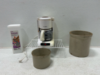 (2) Taracotta Pots (1) Kitchen cabinet racks (1) Mr. Coffee, coffee pot (1) Bread buddy