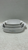 (1) Set of baking dishes (1) Assororted kitchenware (1) Box of coffee mugs - 3