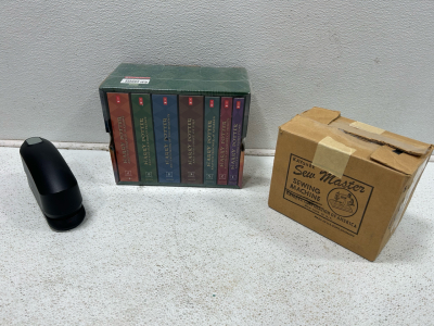 (1) Unopened Harry Potter book series (1) Vintage mini sewing machine (1) Electric stapler and more!