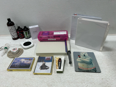 (1) Office supplies binders, paper cutter, post its (1) Bathroom box (1) Miscellaneous goods