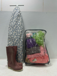 (1) Ironing board (1) Assorted fabric chunks (1) Rubber boots