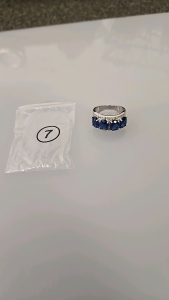 (1) Size 7 Ring with 4 Blue Oval Cut Gems