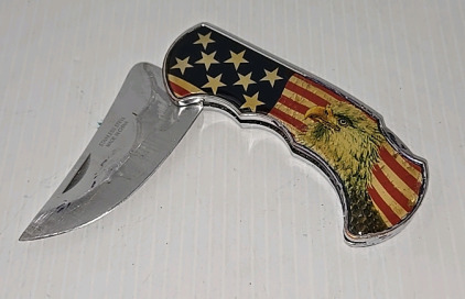 (1) Pocket Knife with an Eagle and American Flag on it