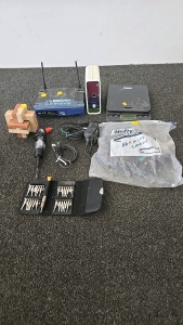 (1) Linksys Router (1) Saga Kitchen Scale (1) Mini Screw Driver Set and More!