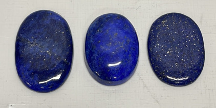 (3) Lapis Lazuli Cabochon Gemstones Oval Cut And Polished Sizes 78.30ct., 51.10ct, 39.85ct.