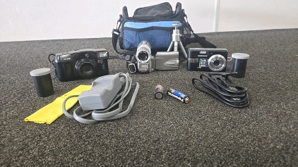 (1) Set of 3 Cameras with Chargers and a Small Tripod