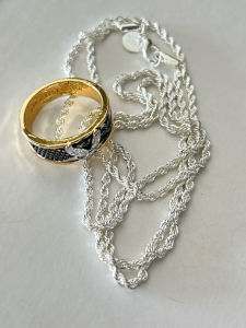 Silver Toned Necklace and Gold Toned Ring Size 12