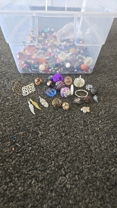 (1) Tub About 1/4 Full of Beads and Beading Materials